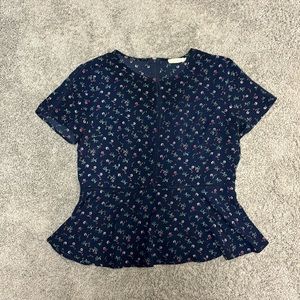 Navy blue ditsy floral peplum top